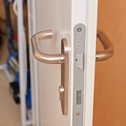 a mortice lock in a white wooden door